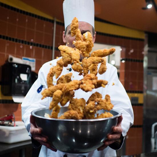 Chicken+Fingers+being+tossed+in+the+air